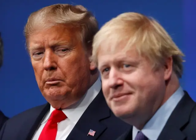 Former US President Donald Trump pictured with Boris Johnson