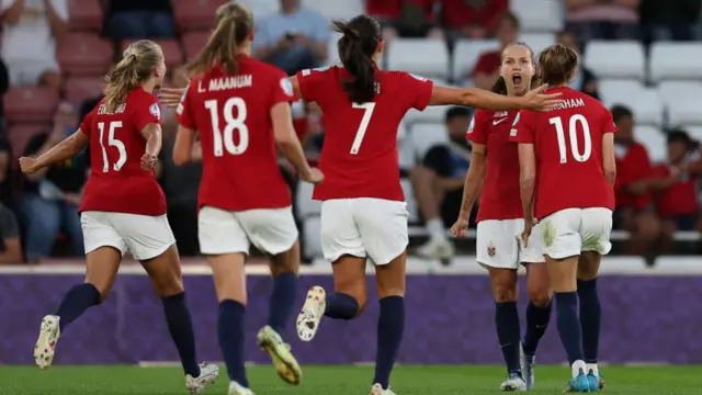 A photo of Norway celebrating a goal