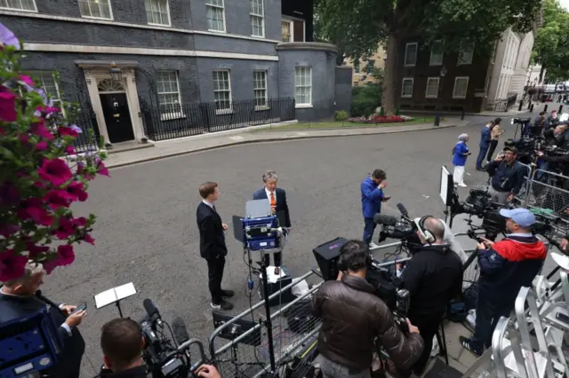 Media gathered outside 10 Downing Street