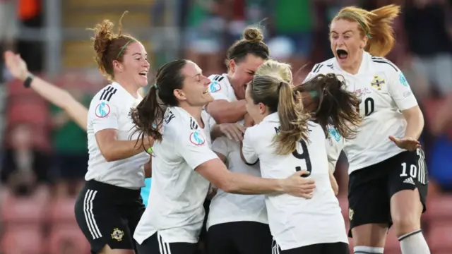 A photo of Northern Ireland celebrating a goal