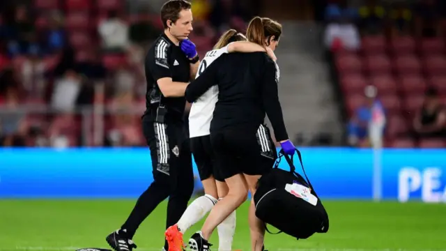 A photo of Simone Magill receivng treatment