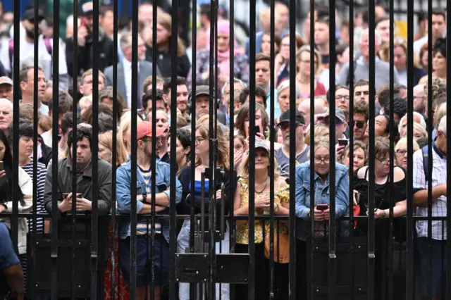 People gathered outside the gates of Downing Street