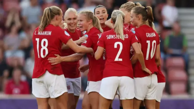 A photo of Norway players celebrating a goal