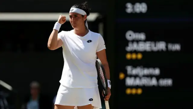 Ons Jabeur pumps her fist in celebration