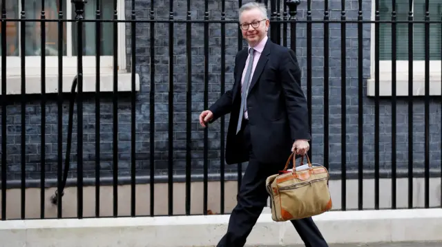 Michael Gove walking outside Downing Street