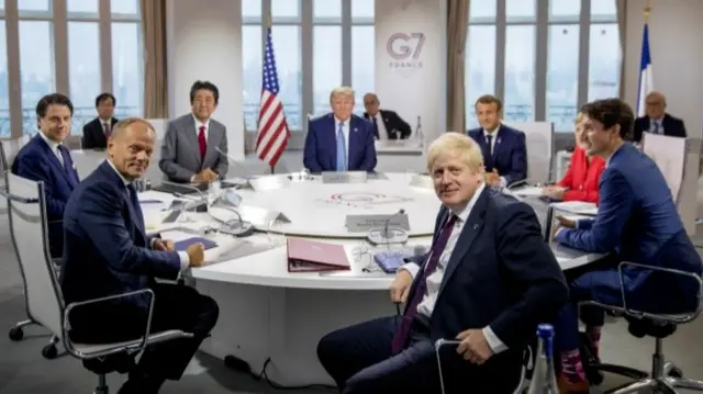 G7 leaders sit round table at meeting on 25th August 2019 in Biarritz