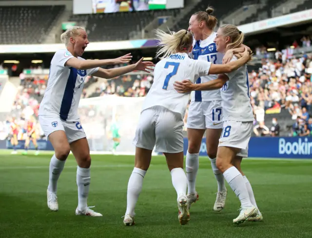 Linda Sallstrom celebrates with Sanni Franssi, Adelina Engman and Eveliina Summanen of Finland after scoring their team's first goal