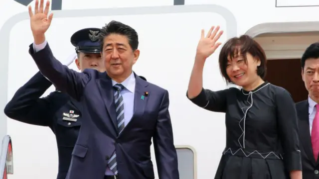 Japanese Prime Minister Shinzo Abe and his wife Akie on April 22, 2019 at Tokyo International Airport, Japan