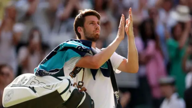 Cameron Norrie applauds the crowd