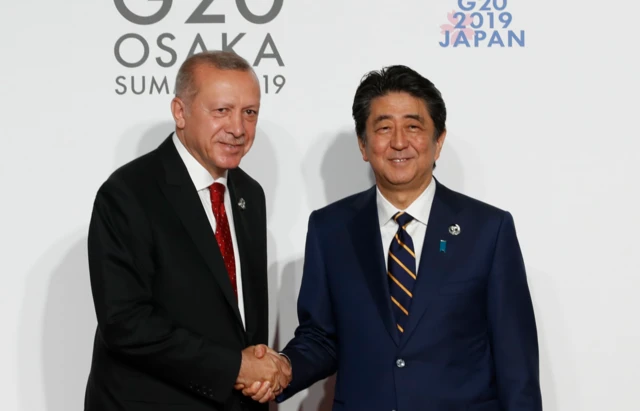 Turkish President Recep Tayyip Erdogan with Shinzo Abe in 2019