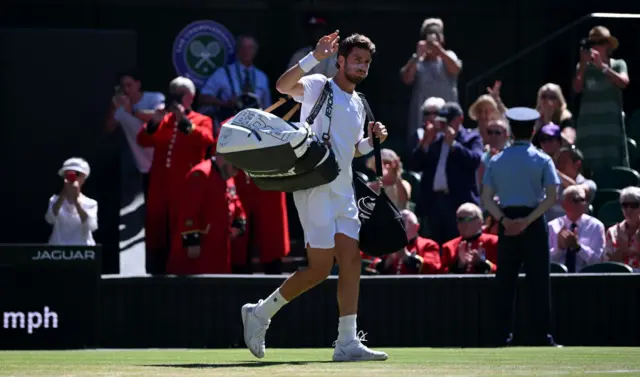 Cameron Norrie comes onto center court at wimbledon