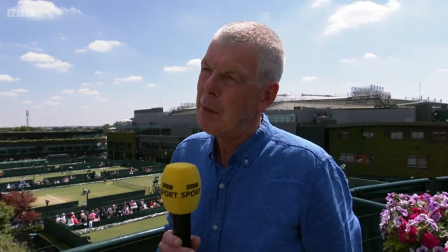 David Norrie with a BBC Sport microphone at Wimbledon