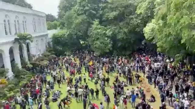 Demonstrators protest inside the President"s House, after President Gotabaya Rajapaksa fled, amid the country"s economic crisis, in Colombo, Sri Lanka, in this screengrab obtained from social media video on July 9, 2022.