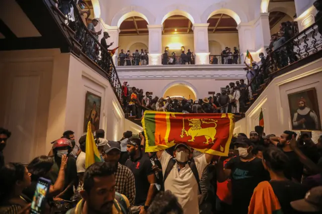 Protesters inside the president's official residence premises during the anti government protest in Colombo, Sri Lanka, 09 July 2022.