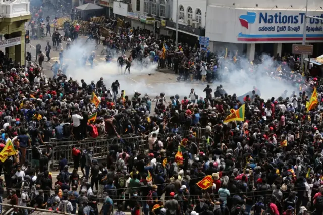 Security forces fire tear gas to disperse an anti government protest rally, calling for the resignation of the president over the alleged failure to address the economic crisis, near the President"s house in Colombo, Sri Lanka, 09 July 2022.