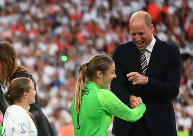 Mary Earps shakes hands with Prince William