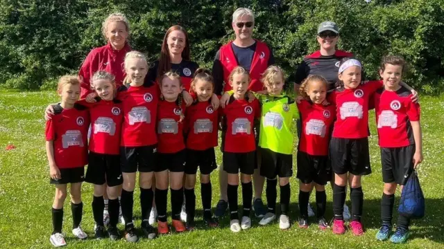 A team photo of girls in the Under-9 side at Knowle FC