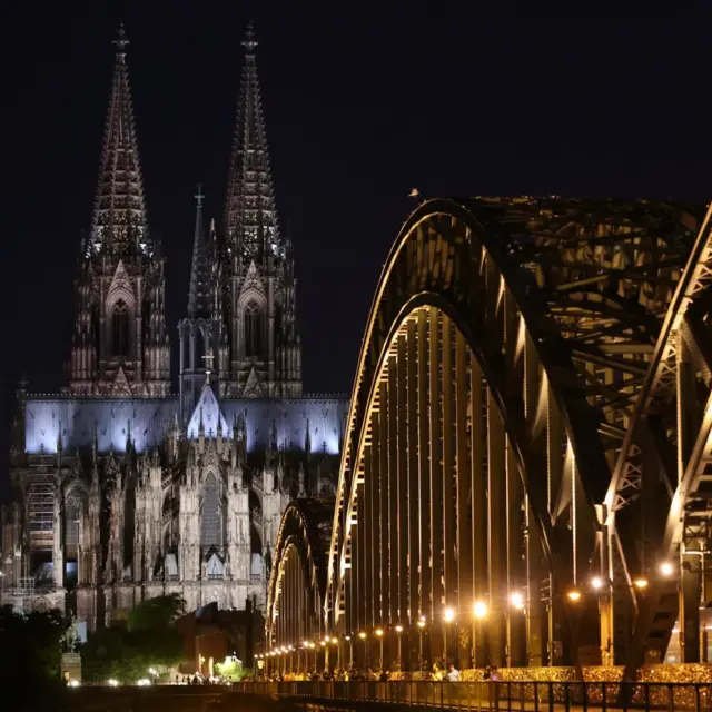 Cologne Cathedral and Hohenzollern Bridge illuminated