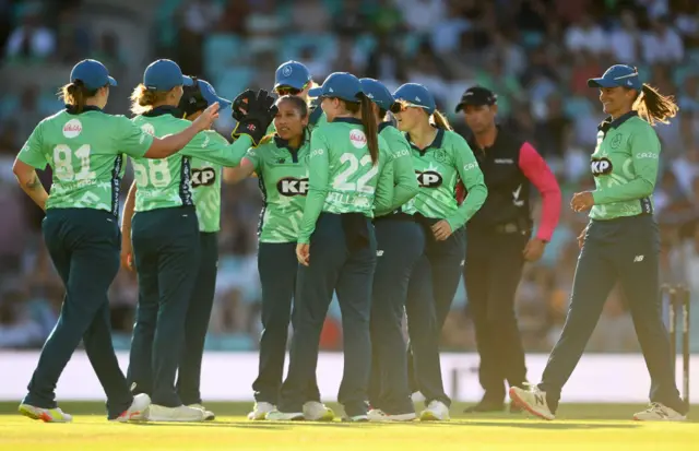 Oval Invincibles celebrating the wicket of Hollie Armitage