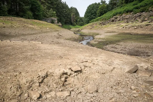 The dried out bed and reduced water levels in the Thruscross reservoir, west of Harrogate in North Yorkshire