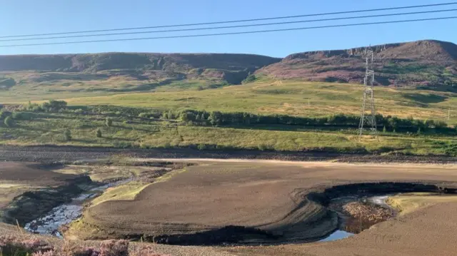 A view of the low water levels at the United Utilities, Woodhead Reservoir, in Derbyshire.