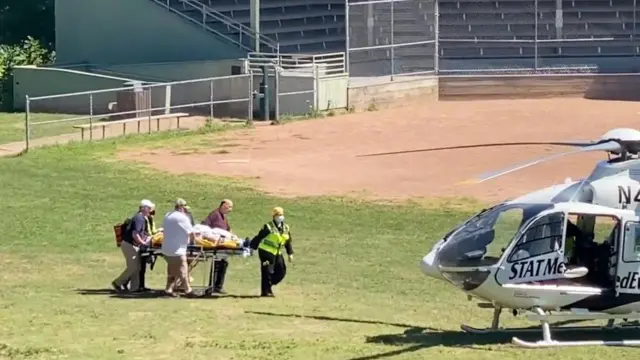 An emergency helicopter attending the scene