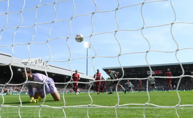 Aleksandar Mitrovic scores against Liverpool