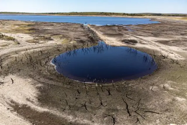 Colliford Lake where water levels have severely dropped exposing the unseen trees and rocks at Cornwall's largest lake and reservoir, covering more than 900 acres of Bodmin Moor, Cornwall.