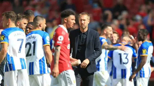 Brighton celebrate winning at Manchester United