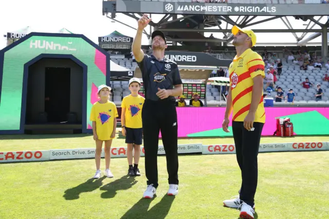 Jos Buttler (right) and Lewis Gregory (left) at the coin toss