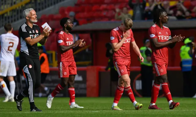 Jim Goodwin and his dejected Aberdeen players at full-time