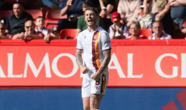 Callum Slattery celebrates