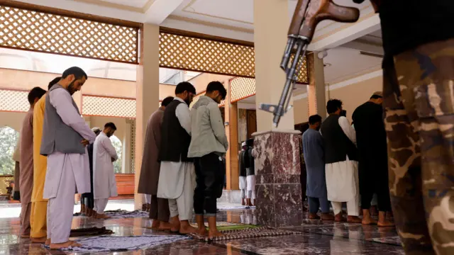 Afghan men in a mosque