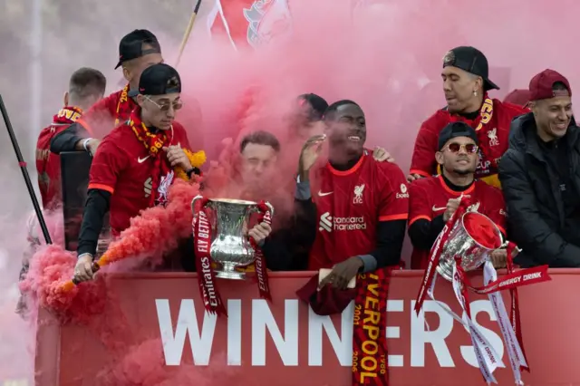 Liverpool parade the League Cup and FA Cup