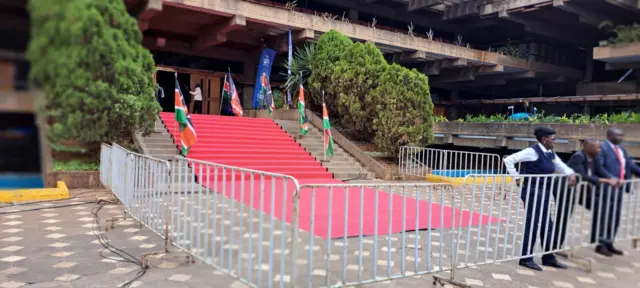 Red carpet in front of building