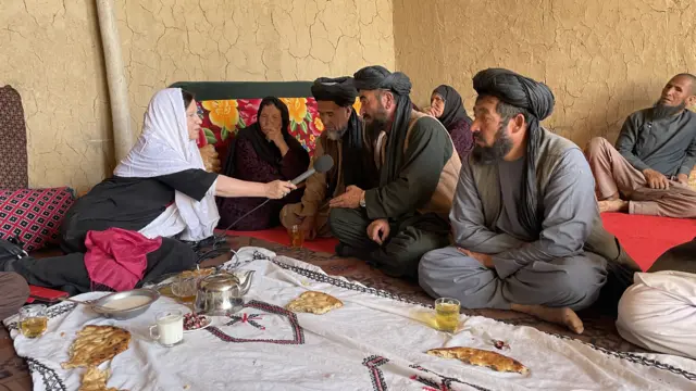 Lyse Doucet speaking to tribal elders and woman