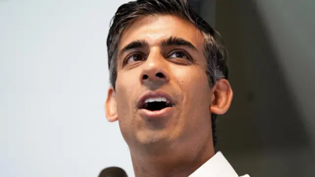 Rishi Sunak speaks at an event