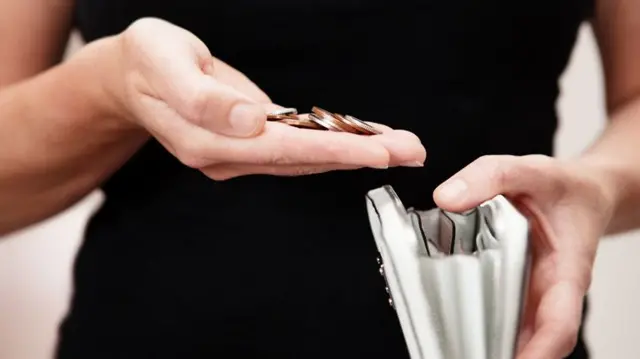 Person with  a wallet (stock image)