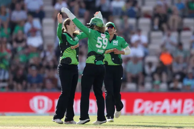 Amanda-Jade Wellington and wicketkeeper Carla Rudd hug as Southern Brave celebrate a wicket