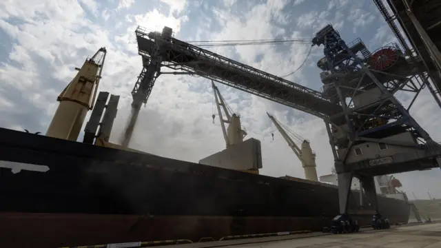 Large ship loaded with grain in a port in Yuzhne, Ukraine