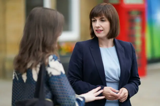 Bridget Phillipson meets a member of the public on results day