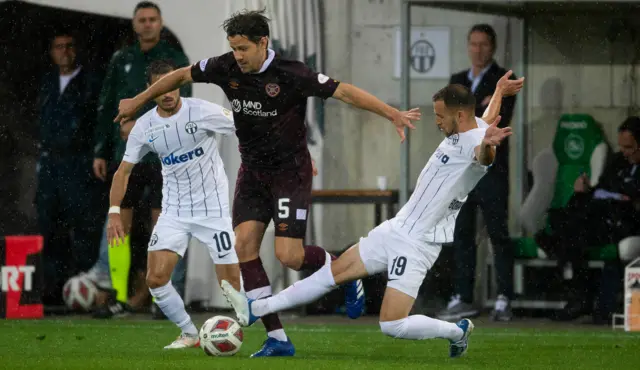 Hearts Peter Haring is tackled by Zurich's Boranijaesevic Nikola during a UEFA Europa League play off match between FC Zurich and Heart of Midlothian at Kybunpark