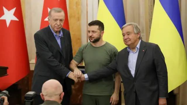 President Erdogan of Turkey poses alongside Ukraine's President Zelensky and UN chief Antonio Guterres