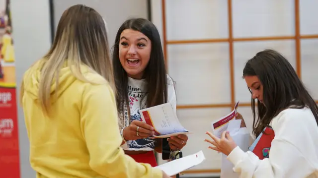 Atlanta Watson reacts after opening her A-level results at Lagan College, Belfast.