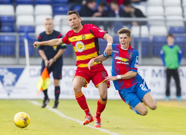 A fresh-faced Ryan Christie is clattered by Gary Miller