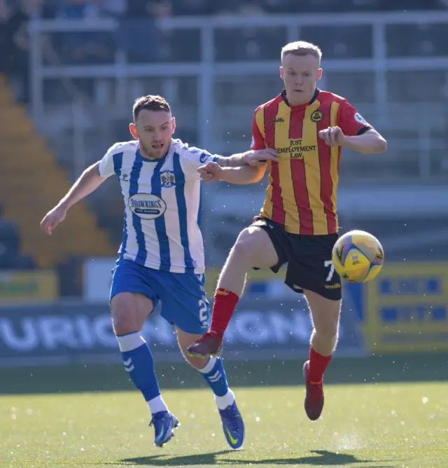 Lee Hodson and Scott Tiffoney challenge for the ball