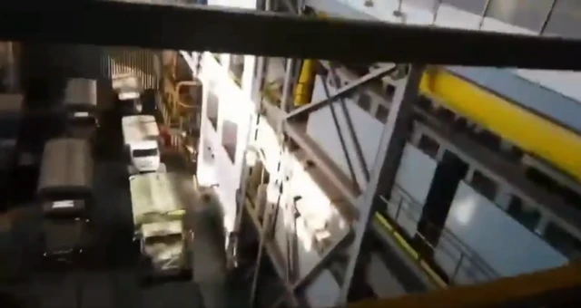 Russian trucks painted with the letter Z are pictured from a high-up vantage point