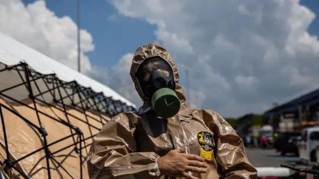 A man in protective clothing at the Zaporizhzhia nuclear power plant