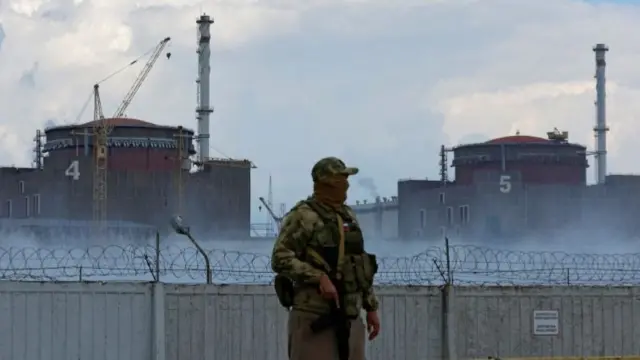 A soldier guarding the Zaporizhzhia nuclear power plant