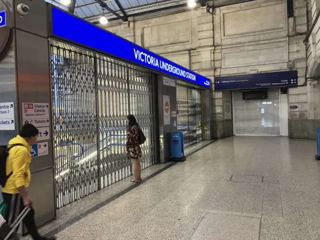 Passenger at locked Victoria station gate